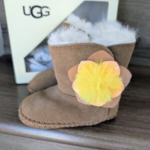 UGG Brown Slippers with Yellow Floral Accent